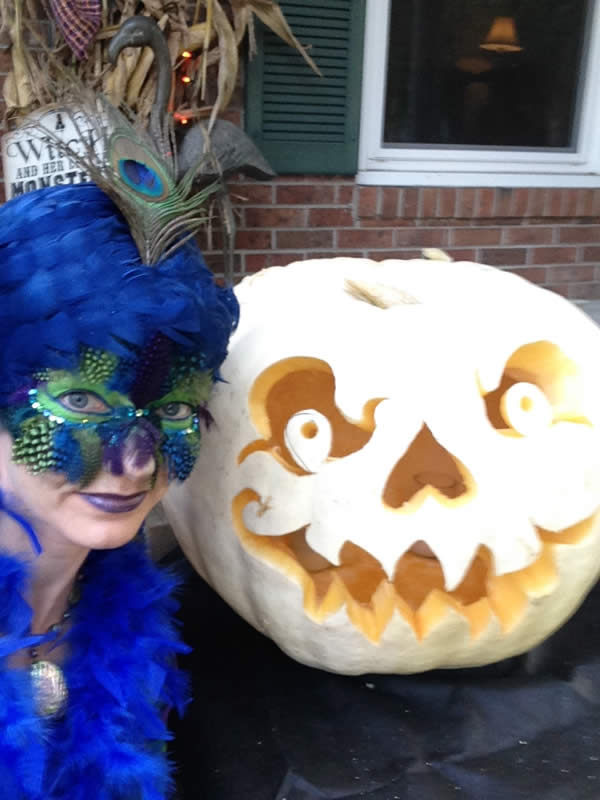 Heron and her Larger-Than-Strictly-Neccessary, Jack-the-Fabulous-Lantern, ready to welcome friends to her Halloween Party