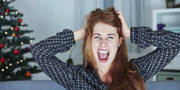 young girl screams because of bad christmas stress 