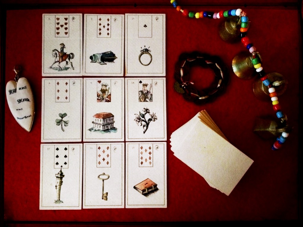 a three-by-three square of drawn cards