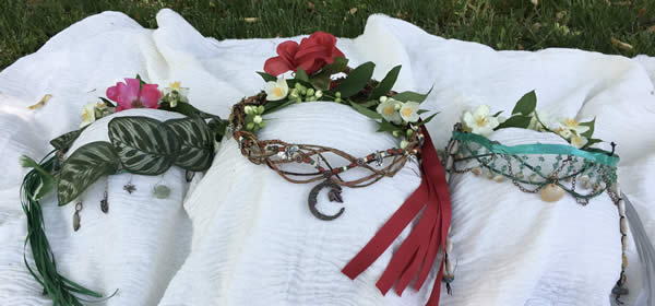  Crowns worn by the MayQueen (center) the Cauldronkeeper (right) and the Besomkeeper (left.) Our women's mysteries group, Sisters of the Cauldron, crafted these together. Photo by Heron Michelle