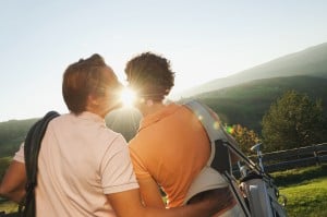 Italy, Kastelruth, couple standing on golf course