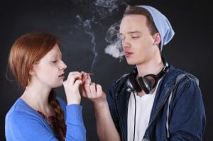Teenagers smoking marijuana joint