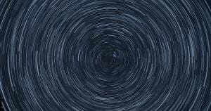 Time-lapsed photography of the stars as we perceive them from a rotating Earth, creating rings of circles