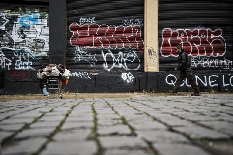 SE Portland street life, all your belongings in a shopping cart. Constantly on the move in a sea of Graffiti.