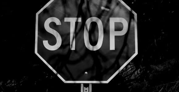 red and white stop road sign