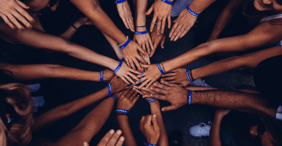 group of people huddling