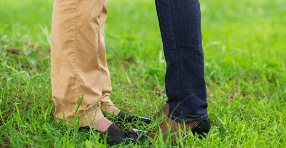 two people standing off
