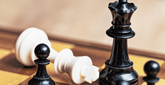 toppling the patriarchy illustrated with chess pieces