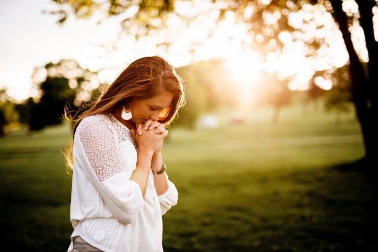 Photo of a woman praying