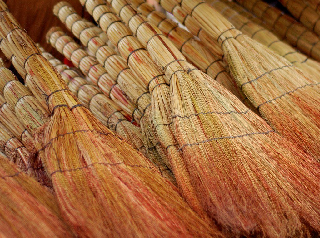 Brooms for sale in a Tbilisi market. Image by Vladimer Shioshvili via Wikimedia Commons, CC license 2.0