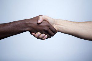 an interracial handshake