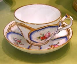 a china tea cup on a saucer