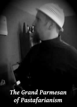 a photo of the author wearing a colander with the title "The Grand Parmesan of Pastafarianism"