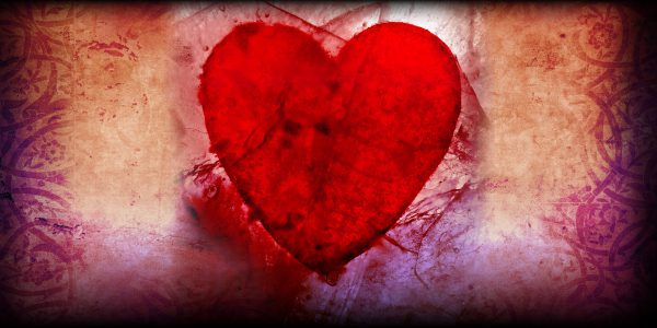 a hand drawn red heart on a gold background