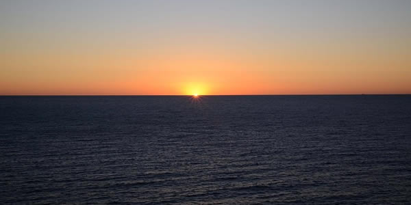 a sunrise over the ocean