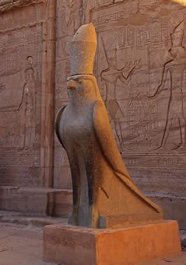 a statue of Heru (Horus) in the form of a hawk with a very large hat