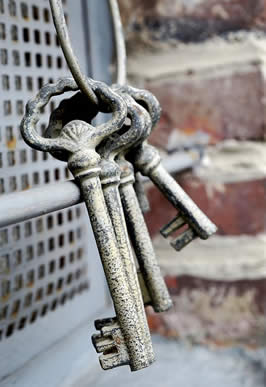 three skeleton keys on a key chain