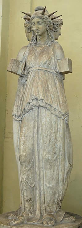 a statue with three faces representing Hecate