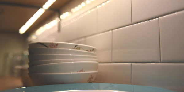 bowls stacked drying on a counter after being washed