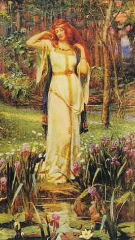 a woman in a dress wearing a necklace