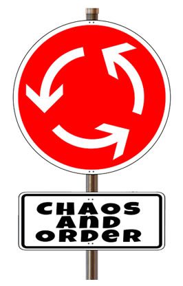 a red sign showing arrows pointing in a circle with the words "chaos and order" below it