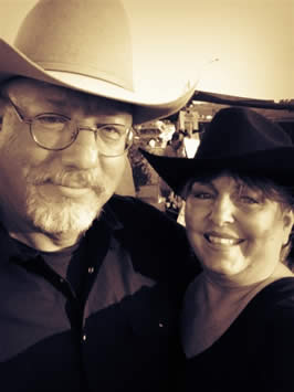 a photograph of the author and an employee at the gun range