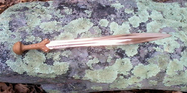 a blade placed on a rock pictured from above