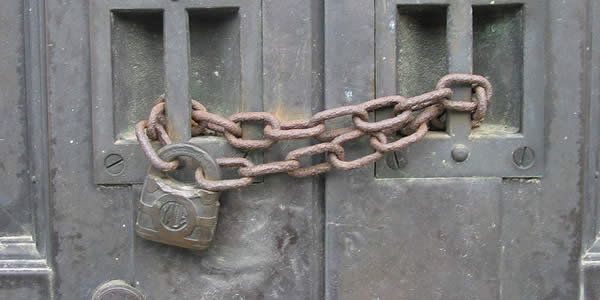 a chained and padlocked double door