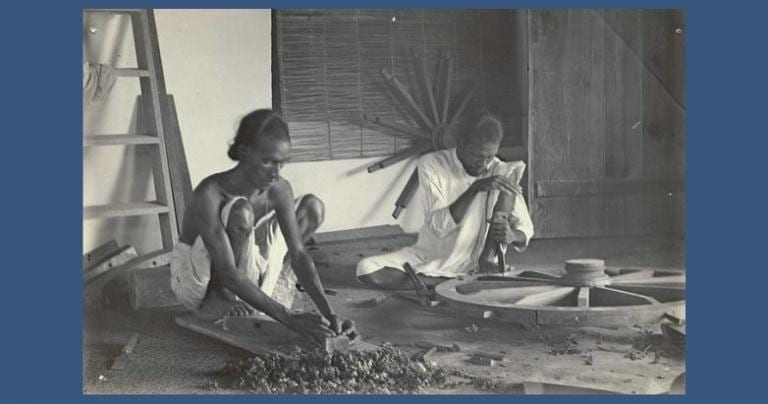 Carpenters making a cart by hand