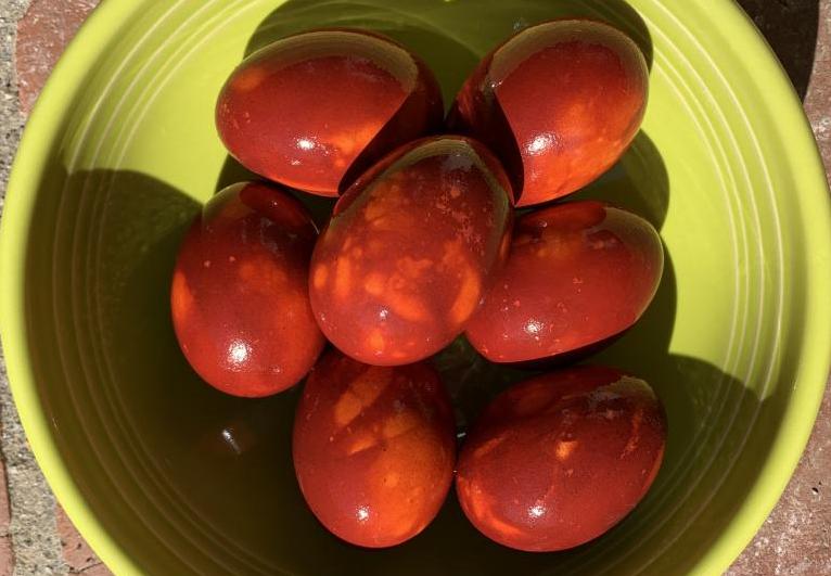 A photo of A Bowl of Red Krashanky Eggs