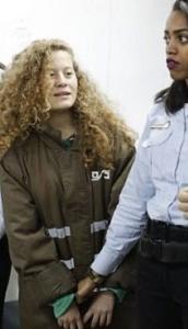 Palestinian activist Ahed Tamimi appears at a military court at the Israeli-run Ofer prison in the West Bank, December 28, 2017 (AFP PHOTO / Ahmad GHARABLI)