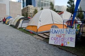 poverty "Occupy Boston - tent city" by Tim Pierce is licensed under CC BY 2.0.