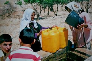 "Bedouin women get water from a well, Israel" by water.alternatives is licensed under CC BY-NC 2.0.