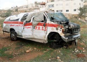 "Palestinian Red Crescent destroyed ambulance" by scottmontreal is licensed under CC BY-NC 2.0. Gaza hospitals are in dire straits with many of their ambulances damaged by Israeli airstrikes