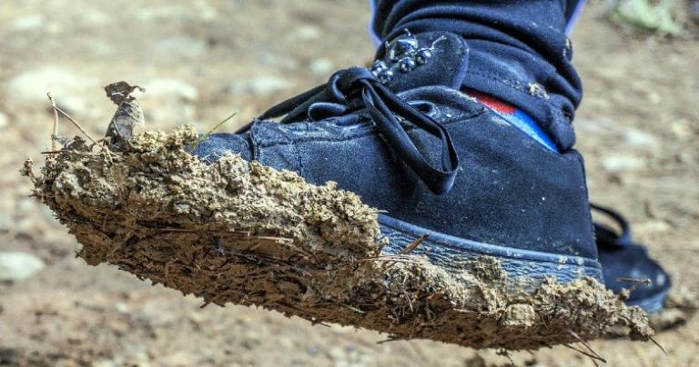 Blue muddy shoe.
