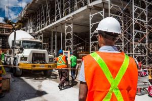 Construction crews make room for each other