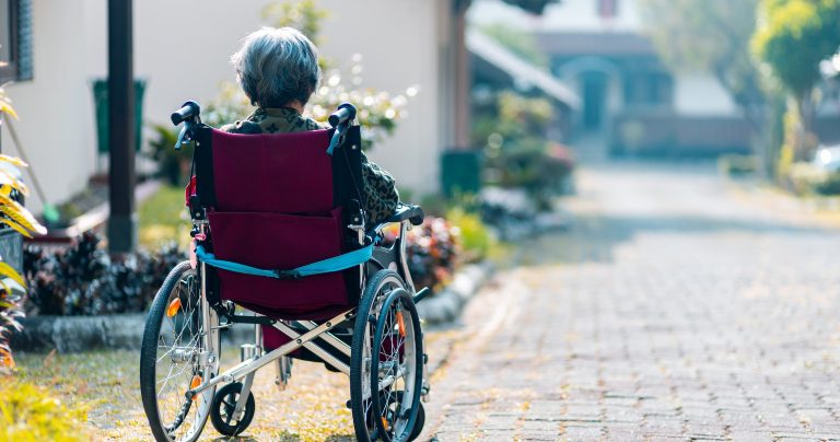 Woman in wheelchair.