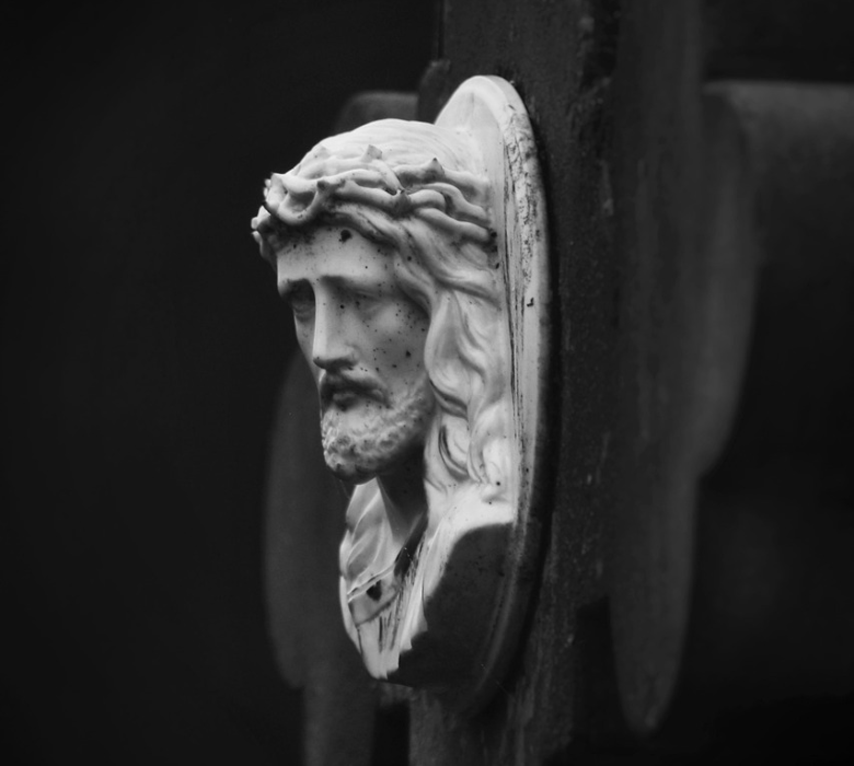 Christ and a tombstone.