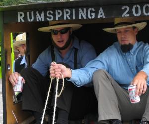 Why are Evangelicals Afraid of Rumspringa? Two Amish men in buggy holding beer can