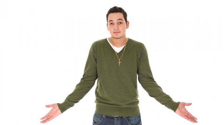 How To Decide When Jesus’ Teachings Are Silent. Man in green sweater and gold cross necklace, shrugging