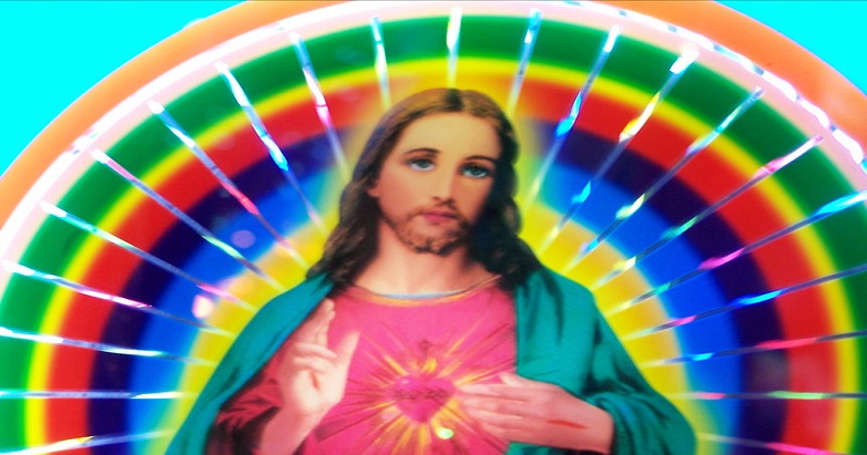 When Did Jesus Mention Transgender, Intersex, and Asexual Folks? Sacred heart Jesus in front of rainbow