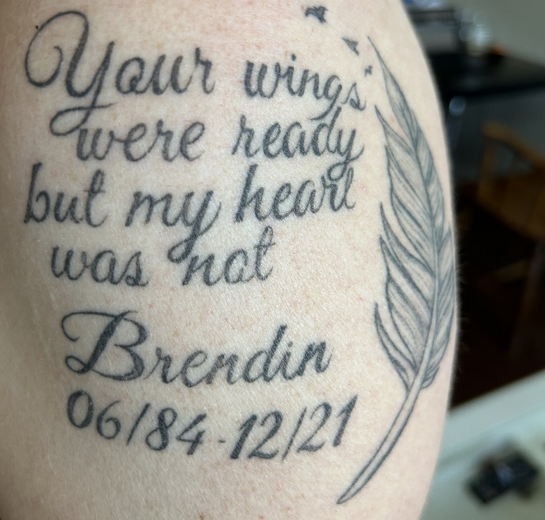 Memorial tattoo with feather. "Your wings were not ready but my heart was not"