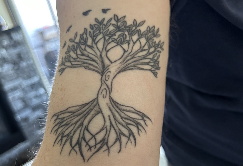 Tree of Life tattoo. Birds flying away