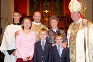 Fr Longenecker w bishop and family