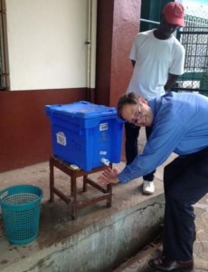 Dr. Tim P. Flanigan demonstrates proper hand washing