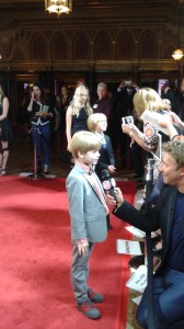 Bobby Batson, who plays Joe Piper, is interviewed on the red carpet
