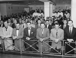CATHOLICS SHOWN KNEELING AT COMMUNION RAIL IN 1955 PHOTO