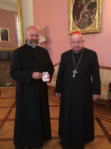 Receiving a relic of Pope St John Paul II from Cardinal Archbishop of Cracow