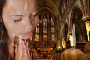 The image of a young woman praying overlays a catheral-type church.