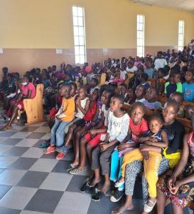 A large group of children during Vacation Bible School at a Zimbabwe chuch